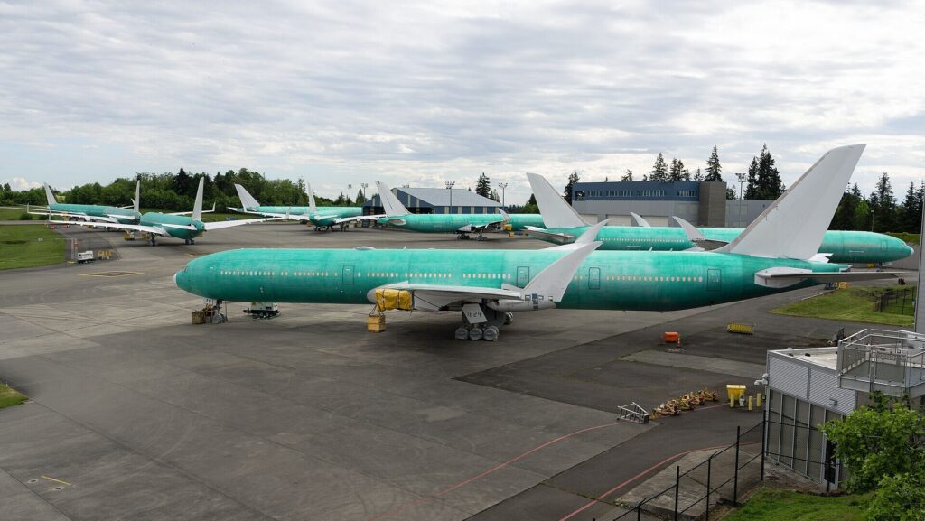 Boeing 777X aircraft parked at Paine Field while awaiting certification and delivery.
