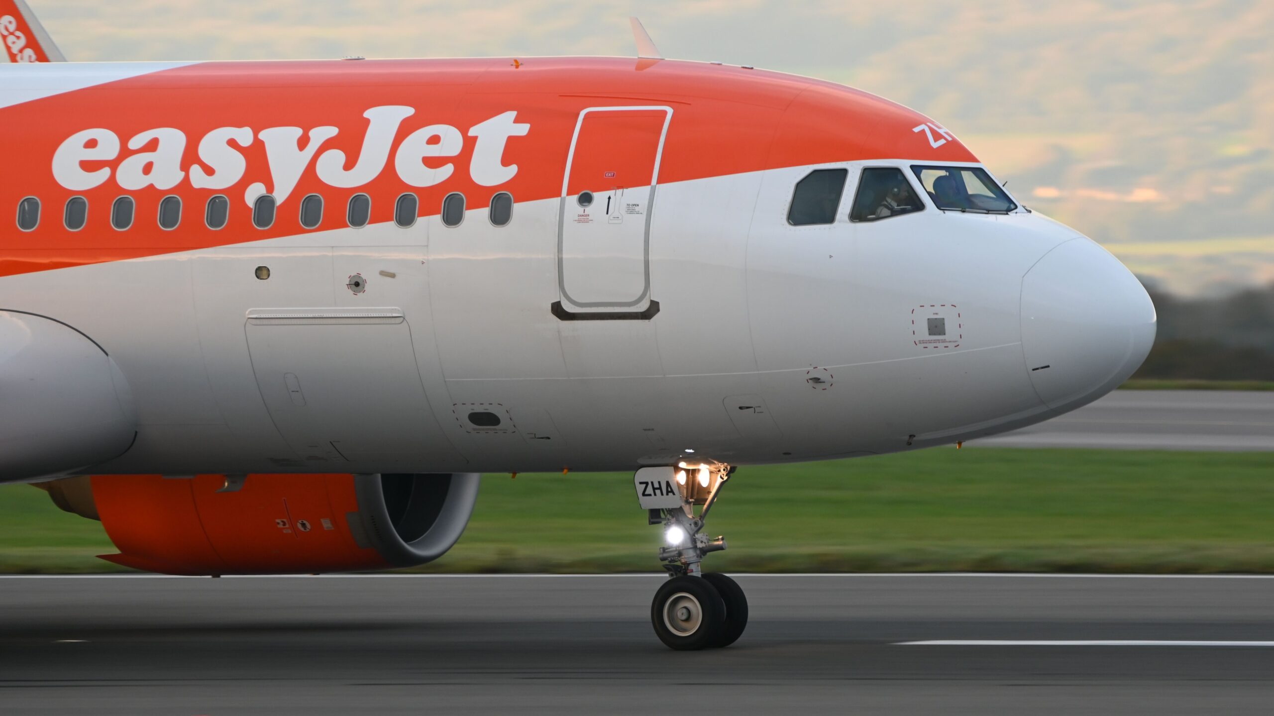 EasyJet aircraft preparing for departure, illustrating how low-cost airlines influenced legacy carriers to introduce Basic Economy fares.