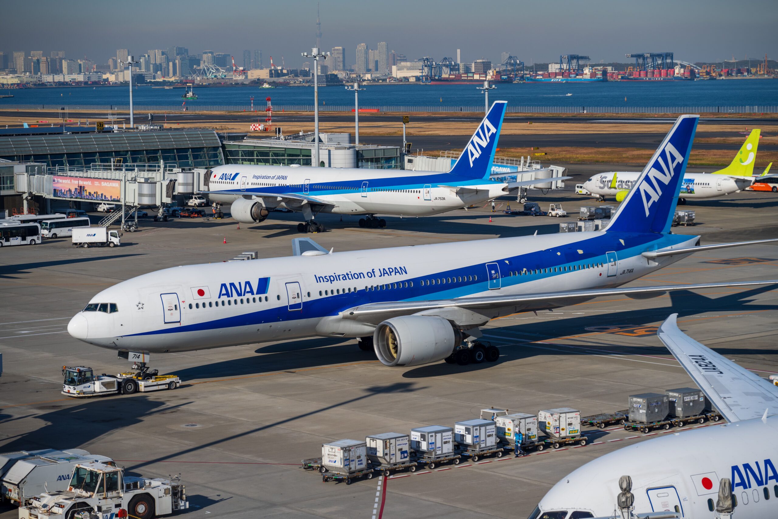 ANA aircraft at Tokyo Haneda Airport illustrating airline miles and award travel
