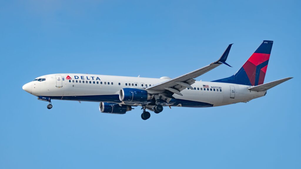 Delta Air Lines aircraft illustrating how to redeem airline miles for award flights